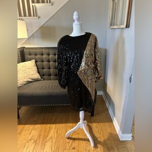 Black and gold sequin dress